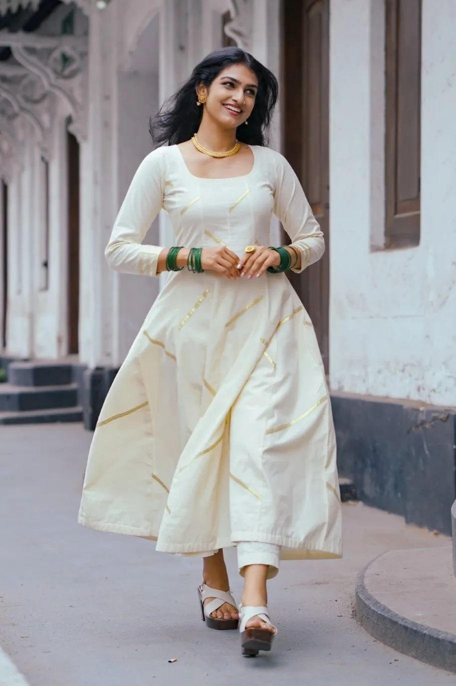 Off White Panel Anarkali with Asymmetrical Zig Zag Kasavu