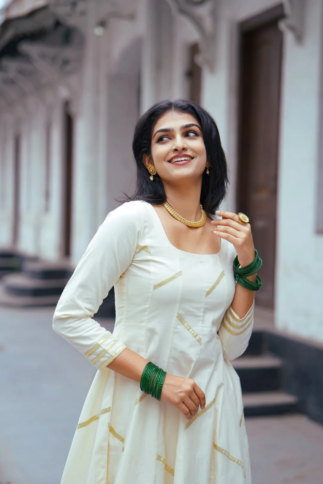 Off White Panel Anarkali with Asymmetrical Zig Zag Kasavu