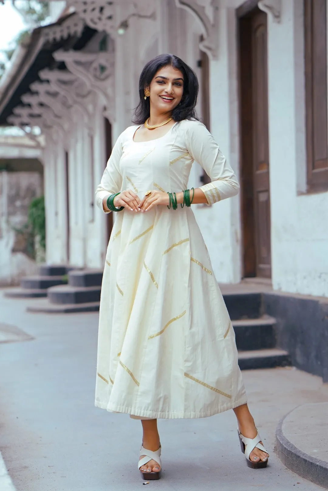 Off White Panel Anarkali with Asymmetrical Zig Zag Kasavu