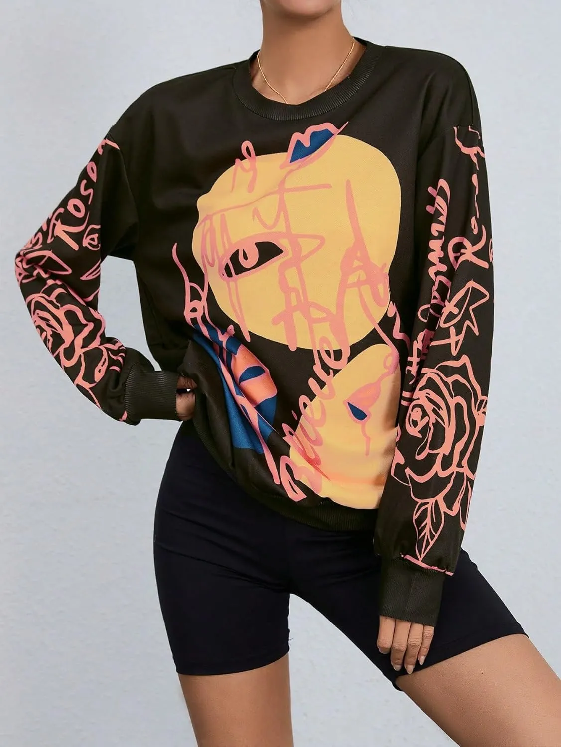 WDIRARA Women's Figure Graphic Print Sweatshirt Round Neck Long Sleeve Contrast Color Graffiti Pullovers