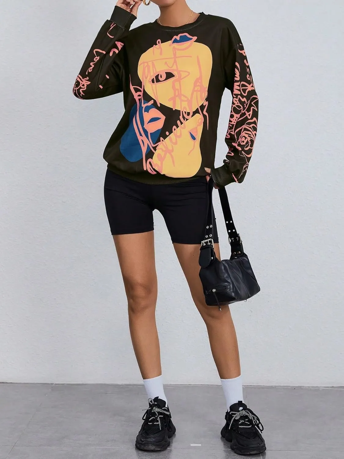 WDIRARA Women's Figure Graphic Print Sweatshirt Round Neck Long Sleeve Contrast Color Graffiti Pullovers